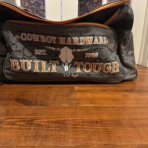 Cowboy Hardware Rolling Duffle Bag